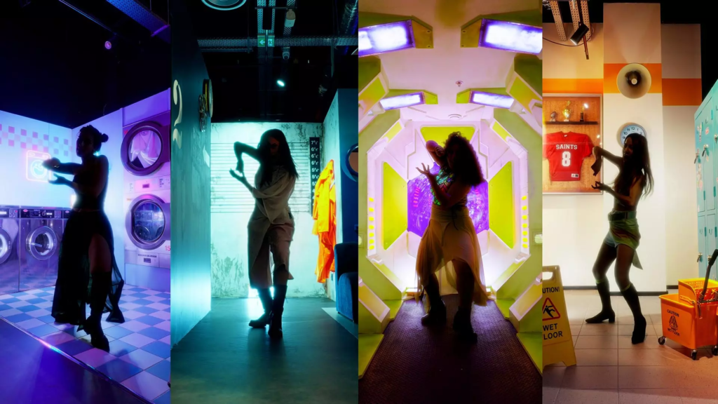 Montage de quatre danseuses en mouvement dans des décors immersifs colorés aux ambiances rétrofuturistes, entre laverie, couloir lumineux et vestiaires.